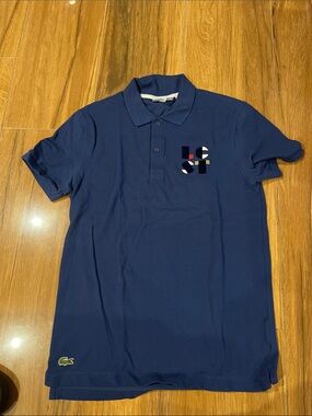 Lacoste Navy Polo with Subtle Chest Graphic
